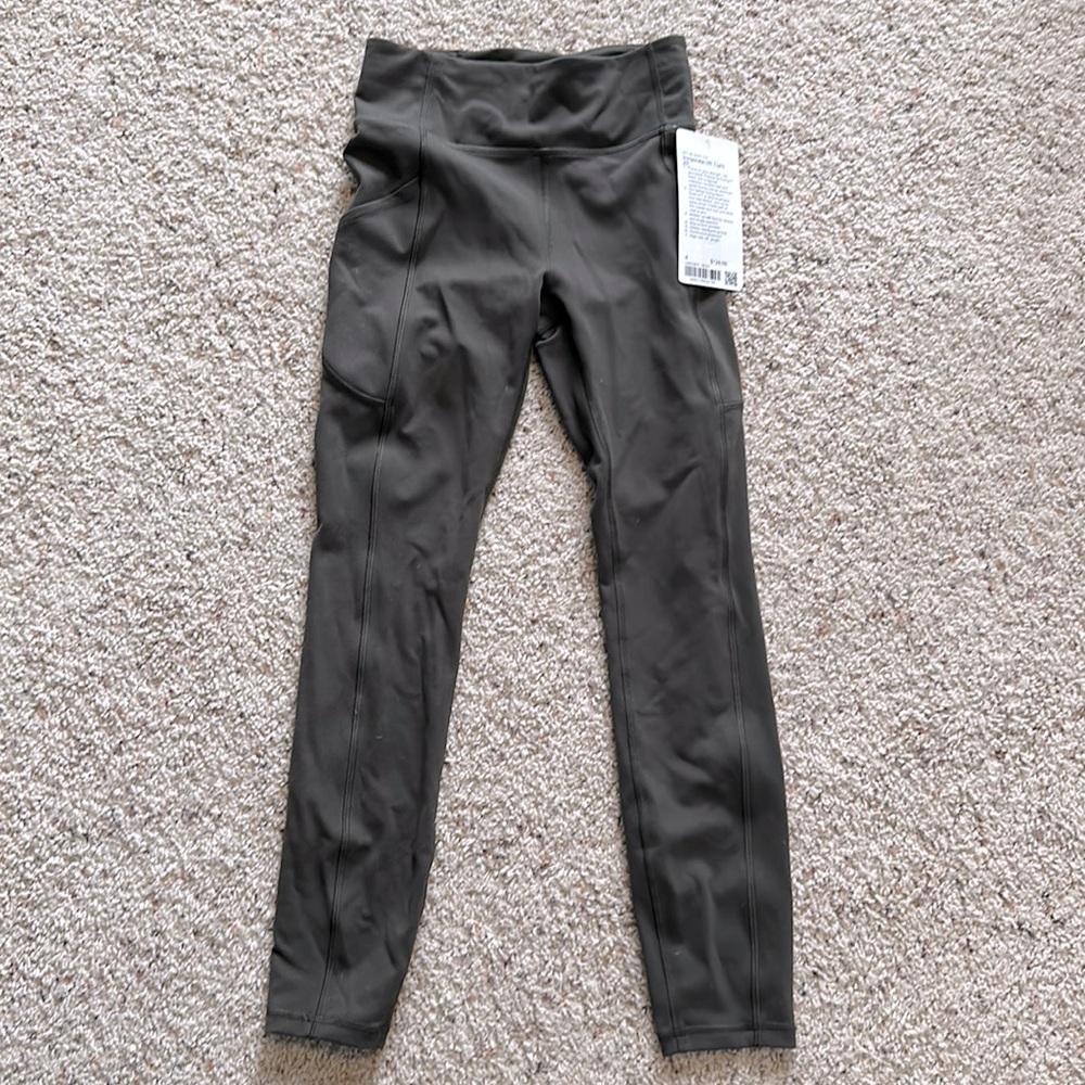 Lululemon Invigorate HR tight with pockets in Olive Green
